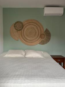 Postel nebo postele na pokoji v ubytování Casa da Árvore Bertioga