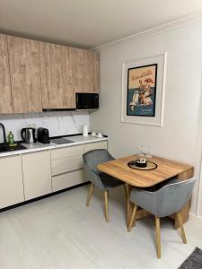 Kuchyň nebo kuchyňský kout v ubytování Golden Sky Residence