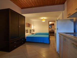 Kuchyň nebo kuchyňský kout v ubytování Toroni Dreams + 75 fotografií