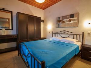 Postel nebo postele na pokoji v ubytování Toroni Dreams