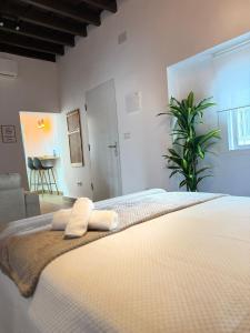 Postel nebo postele na pokoji v ubytování Loft Mamalú Jerez