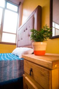 Postel nebo postele na pokoji v ubytování Casa de los Abuelos