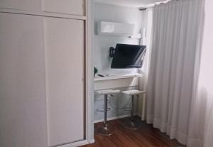 TV a/nebo společenská místnost v ubytování Mono gorlero