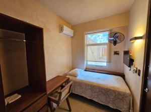 Postel nebo postele na pokoji v ubytování MID-498 Centro