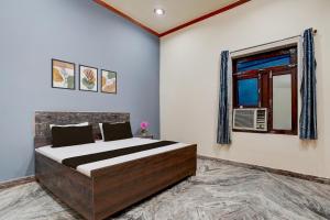 Giường trong phòng chung tại Hotel O Highway Luxury Hotel