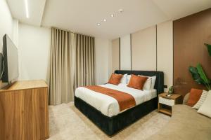 TV a/nebo společenská místnost v ubytování Royal Regency Eg Hotel + 13 fotografií