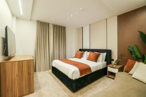 TV a/nebo společenská místnost v ubytování Royal Regency Eg Hotel