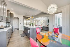 a kitchen and dining room with a table and chairs at Spacious Southern Colorado Home with Mountain Views in Monument