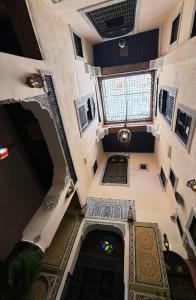 an overhead view of a hallway in a building at Riad Fez Panorama in Fès
