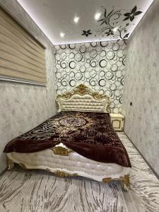 Ένα ή περισσότερα κρεβάτια σε δωμάτιο στο 2х-3х комнатная квартира