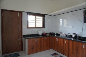 Kuchyň nebo kuchyňský kout v ubytování SIHI luxury Homestay