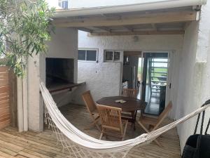 En balkon eller terrasse på Altamar Casas de playa -Casas