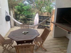 Et tv og/eller underholdning på Altamar Casas de playa -Casas + 3 billeder