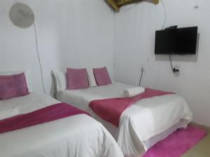 Giường trong phòng chung tại Mphohali Guest House