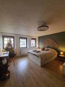 Ένα ή περισσότερα κρεβάτια σε δωμάτιο στο Évasion à Saverne - entre nature et douceur de vivre