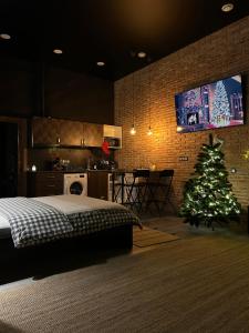 Телевизор и/или развлекательный центр в New Loft Rusafa