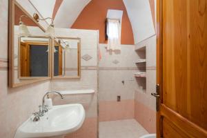 Et badeværelse på Dammuso Rosa