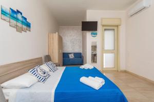 Ένα ή περισσότερα κρεβάτια σε δωμάτιο στο Da Pina E Lu