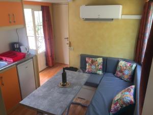 Köök või kööginurk majutusasutuses Chalet MH Ardèche Dolce Via