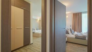 En eller flere senge i et værelse på Breathtaking luxury apartment by MANAGR