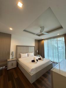 Ένα ή περισσότερα κρεβάτια σε δωμάτιο στο Premium Pool Villa