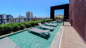 La pileta dentro o cerca de Estúdio Piscina Rooftop, WiFi 1GB, Metrô 600m