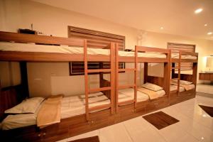 Voodi või voodid majutusasutuse LUMARISE Hotel toas +51 fotot