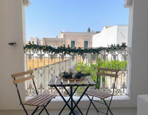 Un balcón o terraza en Don Nicola Elegant and Luxury Apartments - Centro Storico