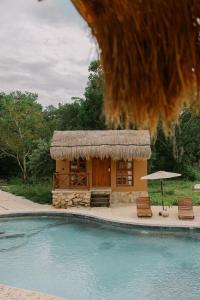 Πισίνα στο ή κοντά στο Quietud Hotel