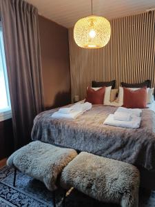 Postel nebo postele na pokoji v ubytování Villa Joutti Luxury house