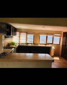 Η κουζίνα ή μικρή κουζίνα στο El Mirador ecológico