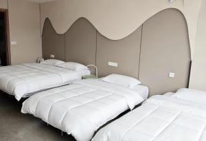 Ένα ή περισσότερα κρεβάτια σε δωμάτιο στο Platinum Selection Hotel 7x24Airport pick-up and drop-off +35 φωτογραφίες