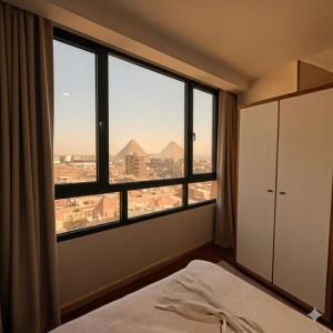 Ένα ή περισσότερα κρεβάτια σε δωμάτιο στο Raf HOTEL