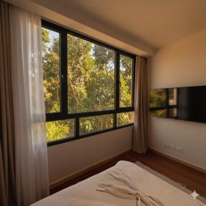 Ένα ή περισσότερα κρεβάτια σε δωμάτιο στο Raf HOTEL