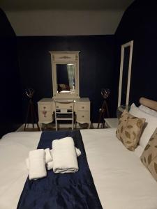 Postel nebo postele na pokoji v ubytování Kings Head Hotel