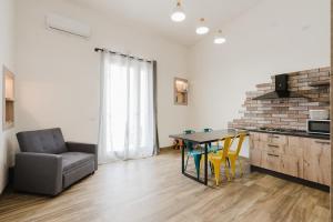 Kuchyň nebo kuchyňský kout v ubytování Da Mariano apartments