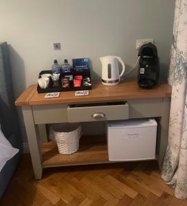 Kohvi ja tee valmistamise võimalus majutusasutuses Verbena