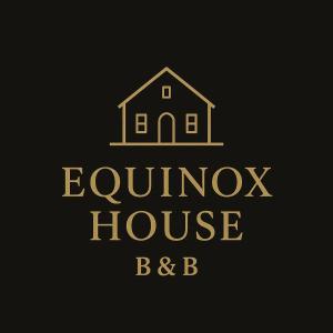 a logo for a house and a house at Equinox house in Tuglie
