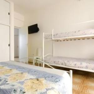 Postel nebo postele na pokoji v ubytování Equinox house