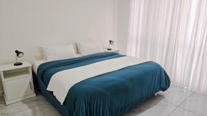 Ένα ή περισσότερα κρεβάτια σε δωμάτιο στο 2 Bed Forest Reserve & Gated community