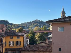 a view of a city with a clock tower at Caterina in Bergamo