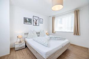 Ένα ή περισσότερα κρεβάτια σε δωμάτιο στο Apart Schachinger