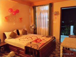 En eller flere senge i et værelse på Arara ibt homestay + 3 billeder