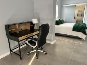 TV a/nebo společenská místnost v ubytování Rissie's Place