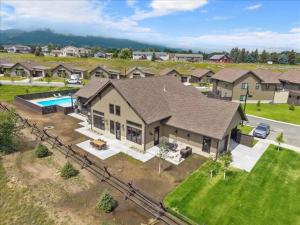 an aerial view of a house with a pool at Alpine Basecamp in Red Lodge