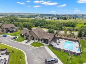 an aerial view of a house with a pool at Ski Run View Red Lodge in Red Lodge