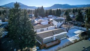 an aerial view of a house with snow on the ground at Daybreak Haven Red Lodge in Red Lodge
