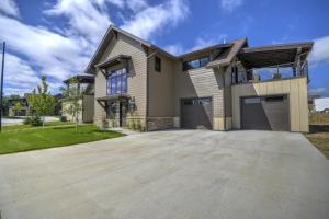 a large house with a driveway at Beartooth Dream, Red Lodge in Red Lodge