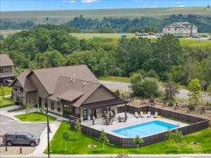 an aerial view of a house with a swimming pool at Beartooth Mountain Lodge - Private hot tub - $50 dollar with 3 night stay in Red Lodge