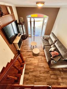 Гостиная зона в Conforto e Tranquilidade em Santo Antonio do Pinhal